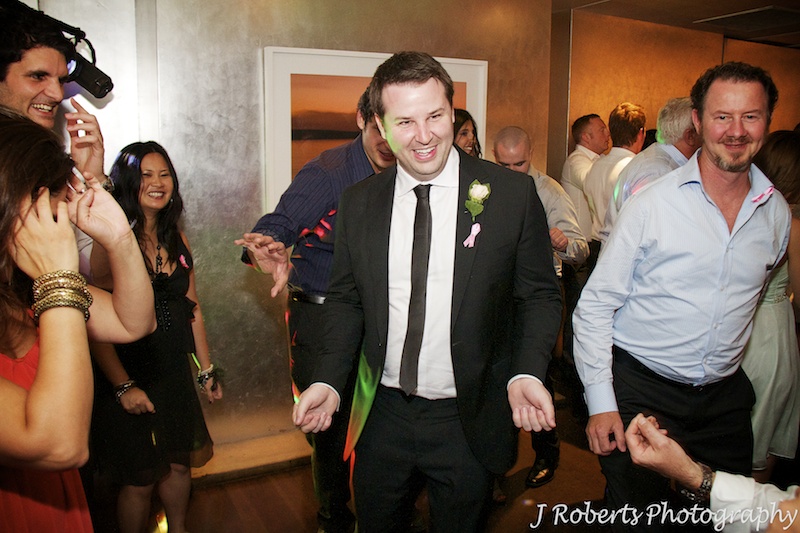 Groom on the dance floor = wedding photography sydney